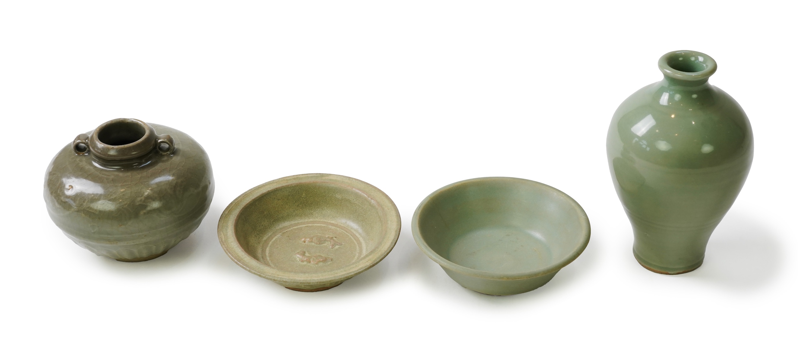 A group of four Chinese Celadon wares - two vases and two dishes, tallest vase 16cm.